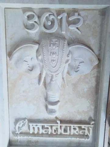 Ganesha Face with Sacred Inscription Stone Mural — OS-SM-051