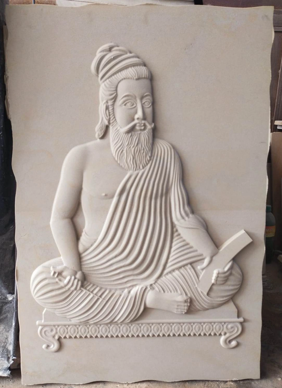 Seated Sage with Manuscript Stone Mural — OS-SM-101 Carved Murals